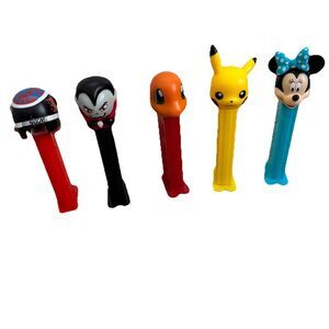 Vintage PEZ Disney NASCAR Pokémon Charmander Pikachu Minnie Vampire Lot
